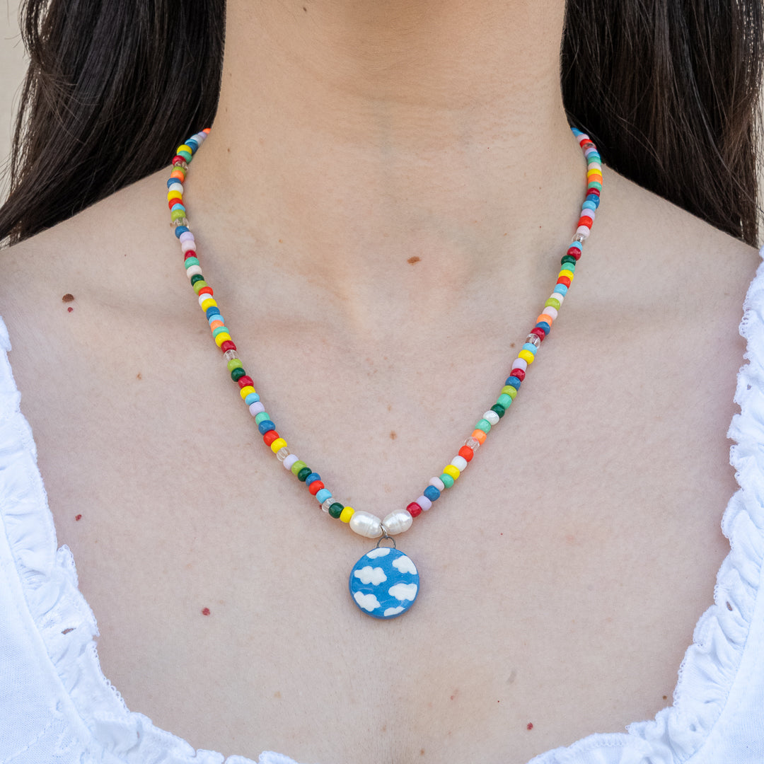 Collana di perline con ciondolo cielo