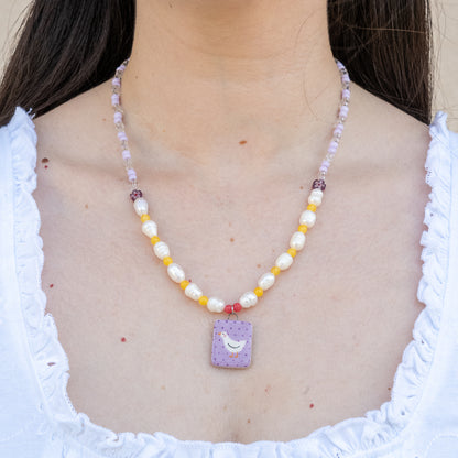Collana con perle e ciondolo paperella