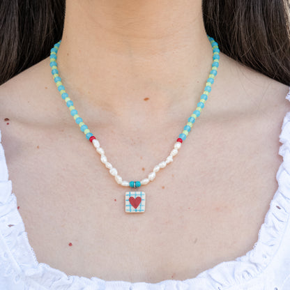 Collana di perline con ciondolo cuore