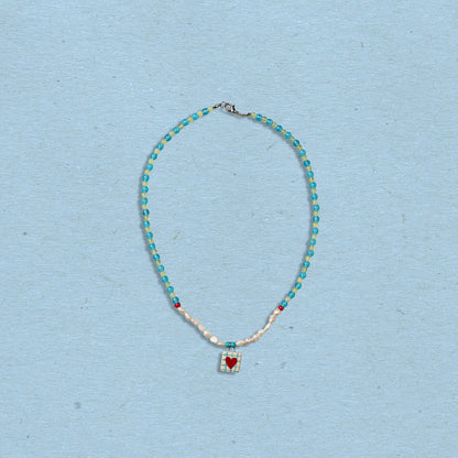 Collana di perline con ciondolo cuore