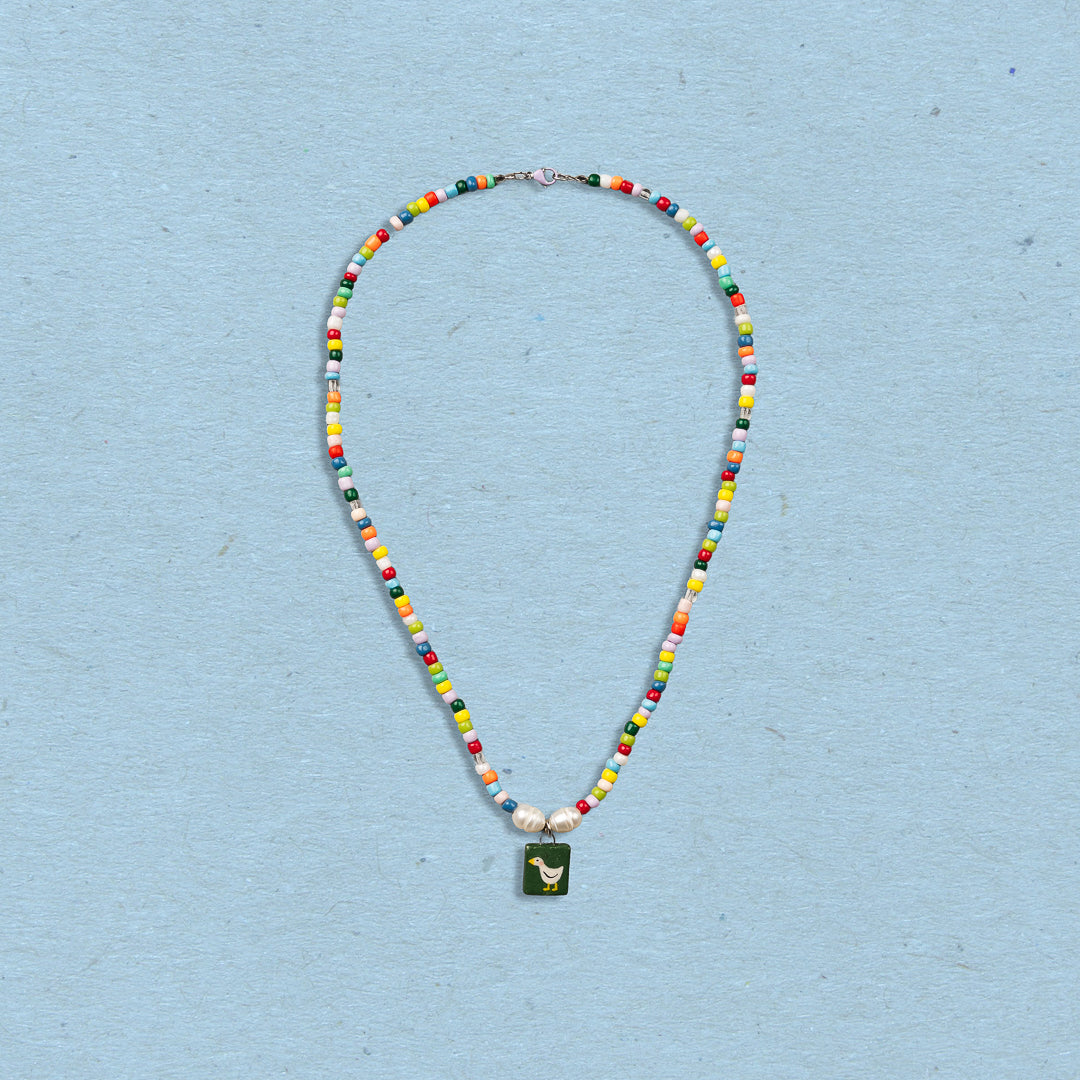 Collana di perline colorate con ciondolo paperella