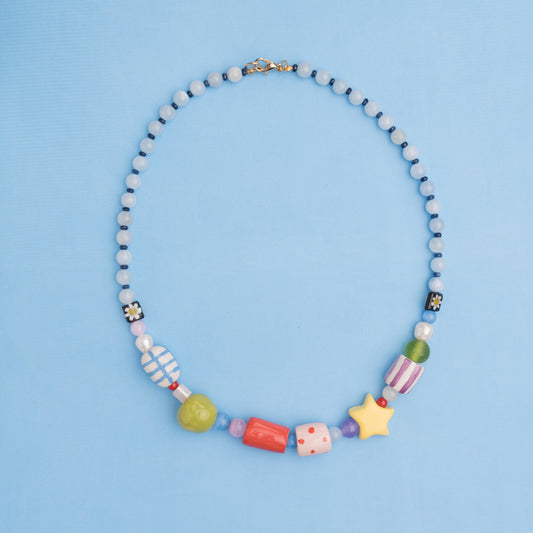 Collana con perline in ceramica e stellina