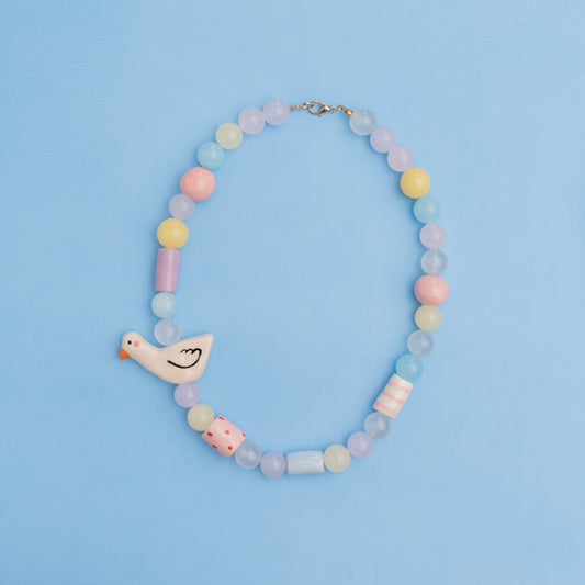 Collana pastello con perline in ceramica e paperella