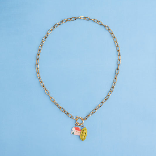 Catenella oro con pisellini e casetta