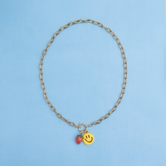 Catenella oro con fragola e smile