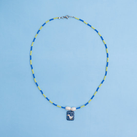 Collanina con ciondolo paperella blu