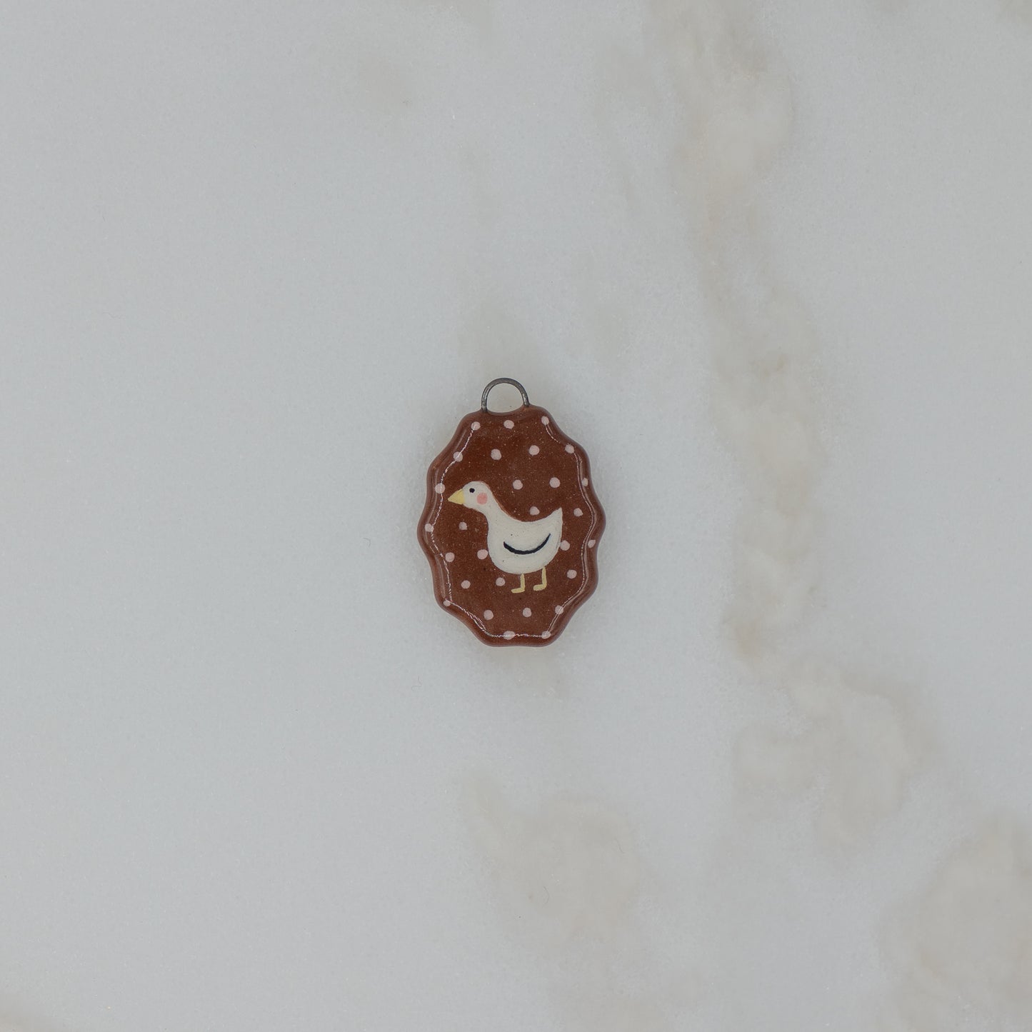 Medagliette con bordo ondulato