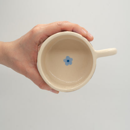 Tazza a quadretti con fiori