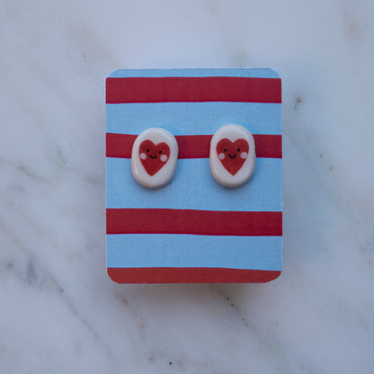 Orecchini a lobo cuoricini sorridenti