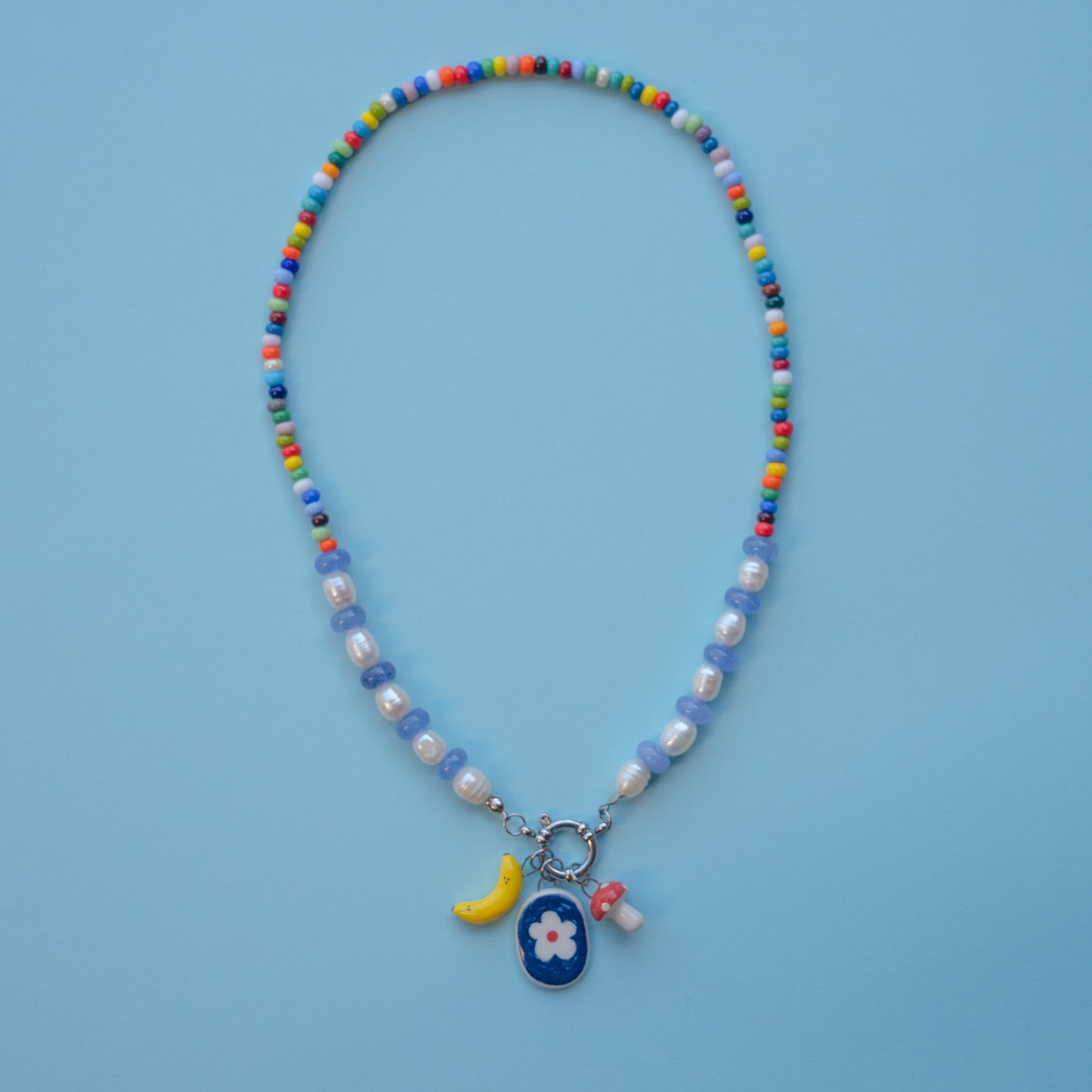 Collana con tris di ciondoli