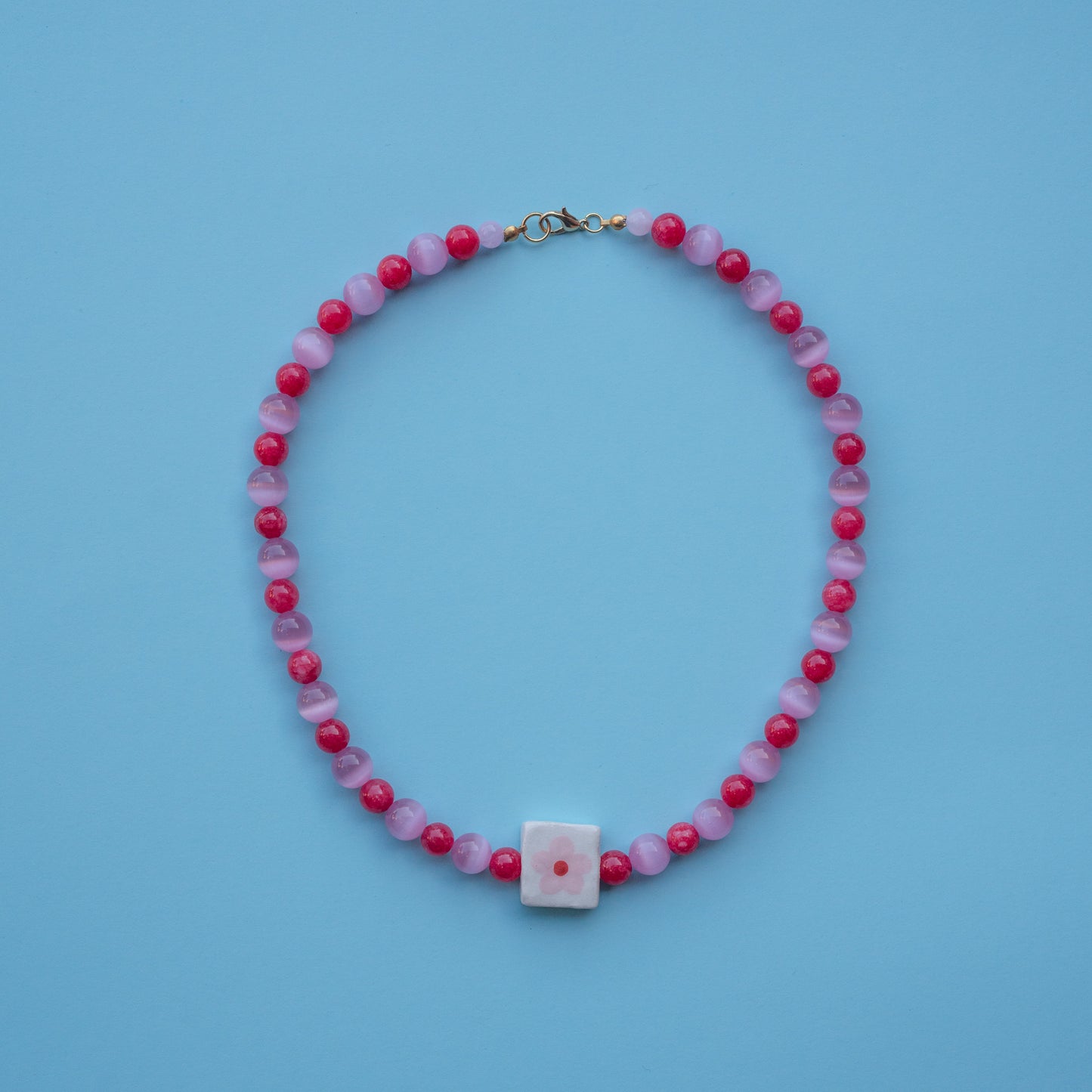 Collana con perlina fiorellino