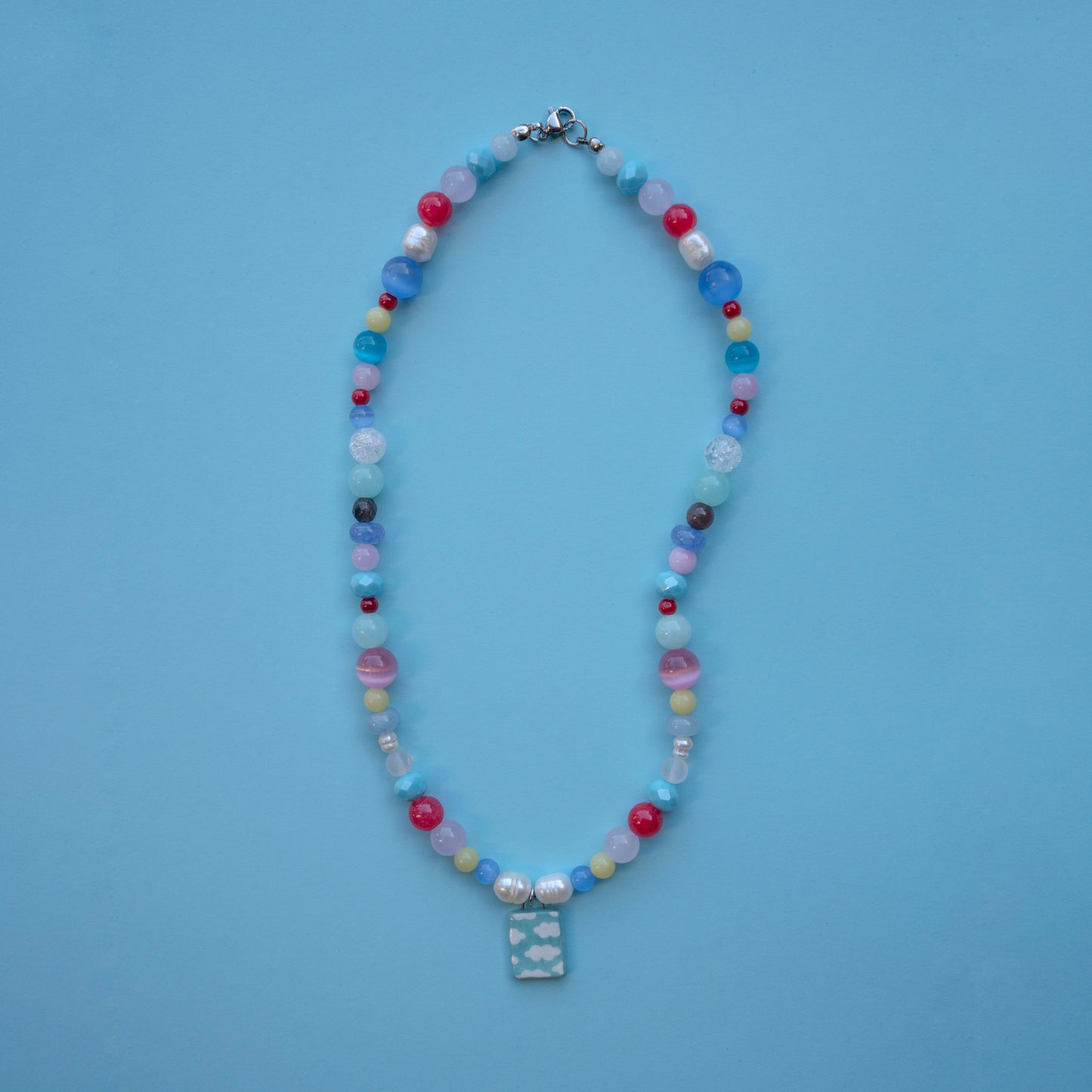 Collana colorata con ciondolo cielo