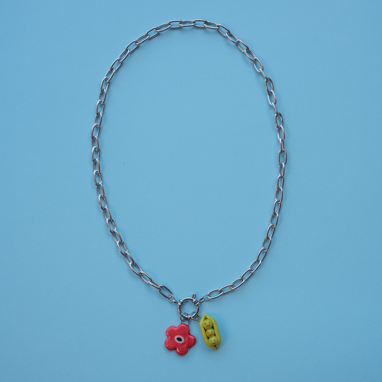 Catenella argento con pisellini e fiore