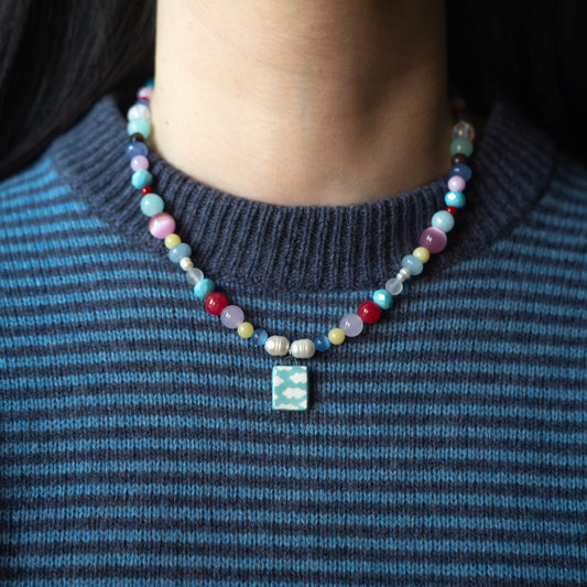 Collana colorata con ciondolo cielo
