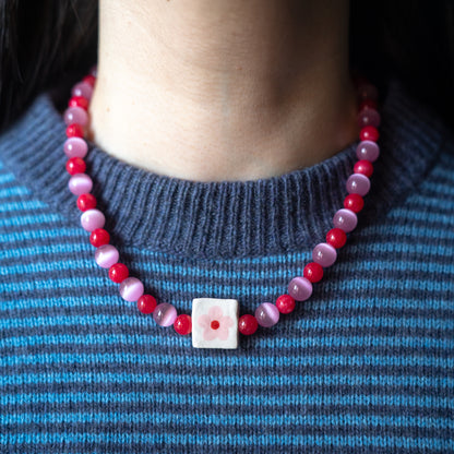 Collana con perlina fiorellino