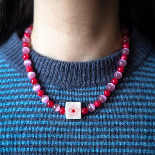 Collana con perlina fiorellino