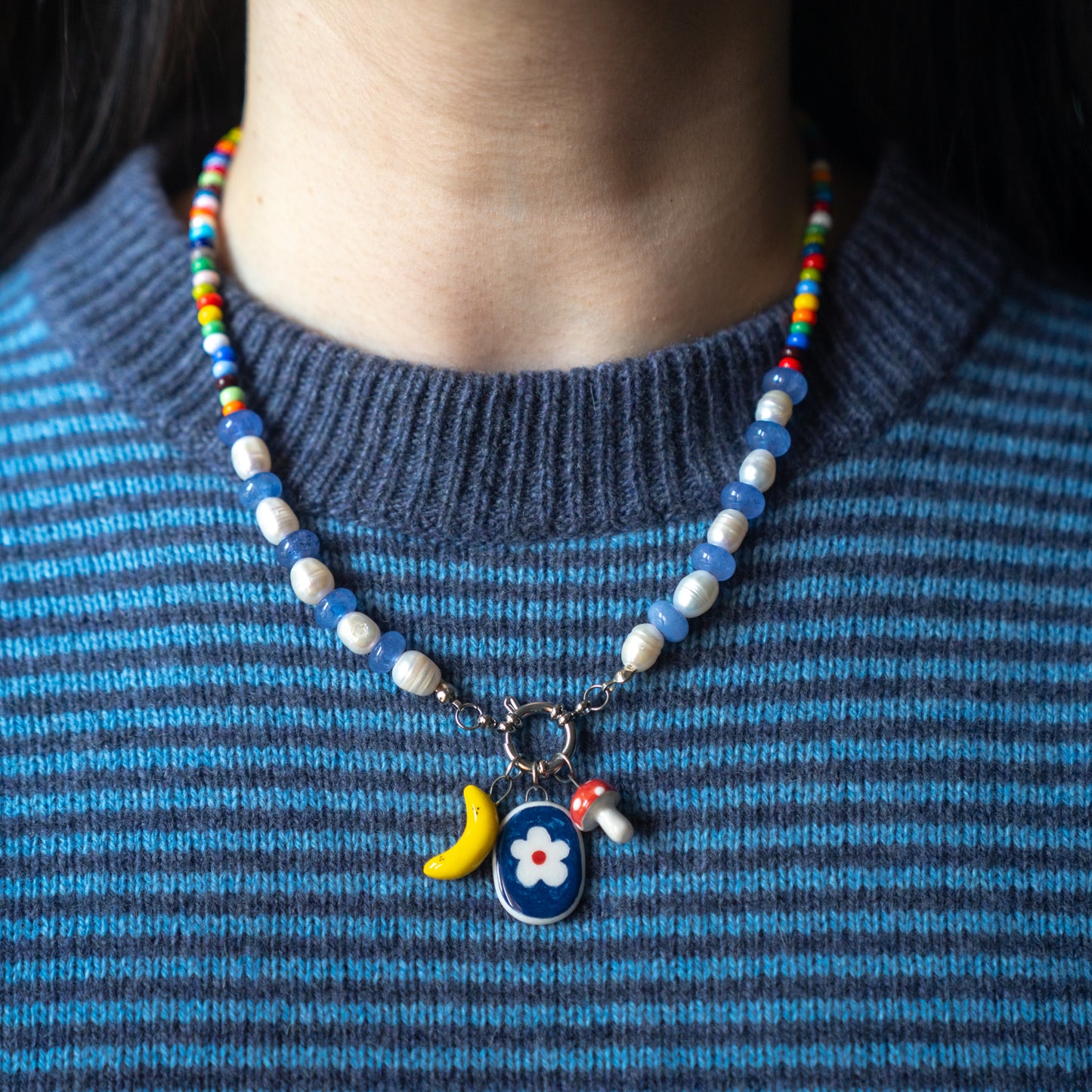 Collana con tris di ciondoli