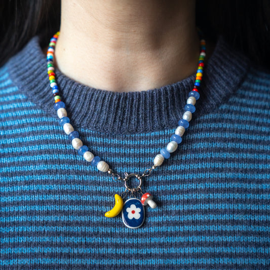 Collana con tris di ciondoli