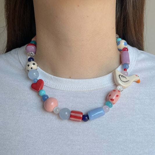 Collana con paperella e cuoricino