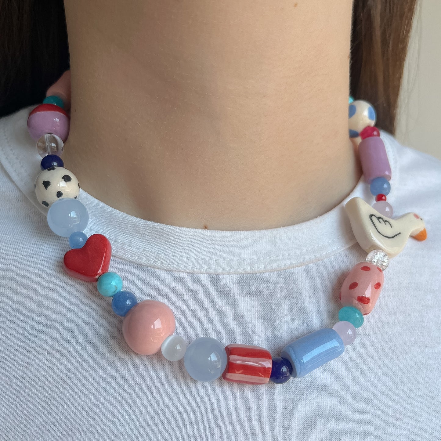 Collana con paperella e cuoricino