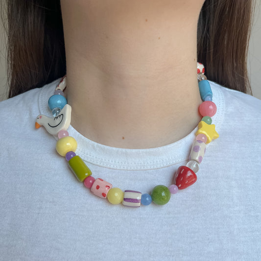 Collana con paperella e stellina
