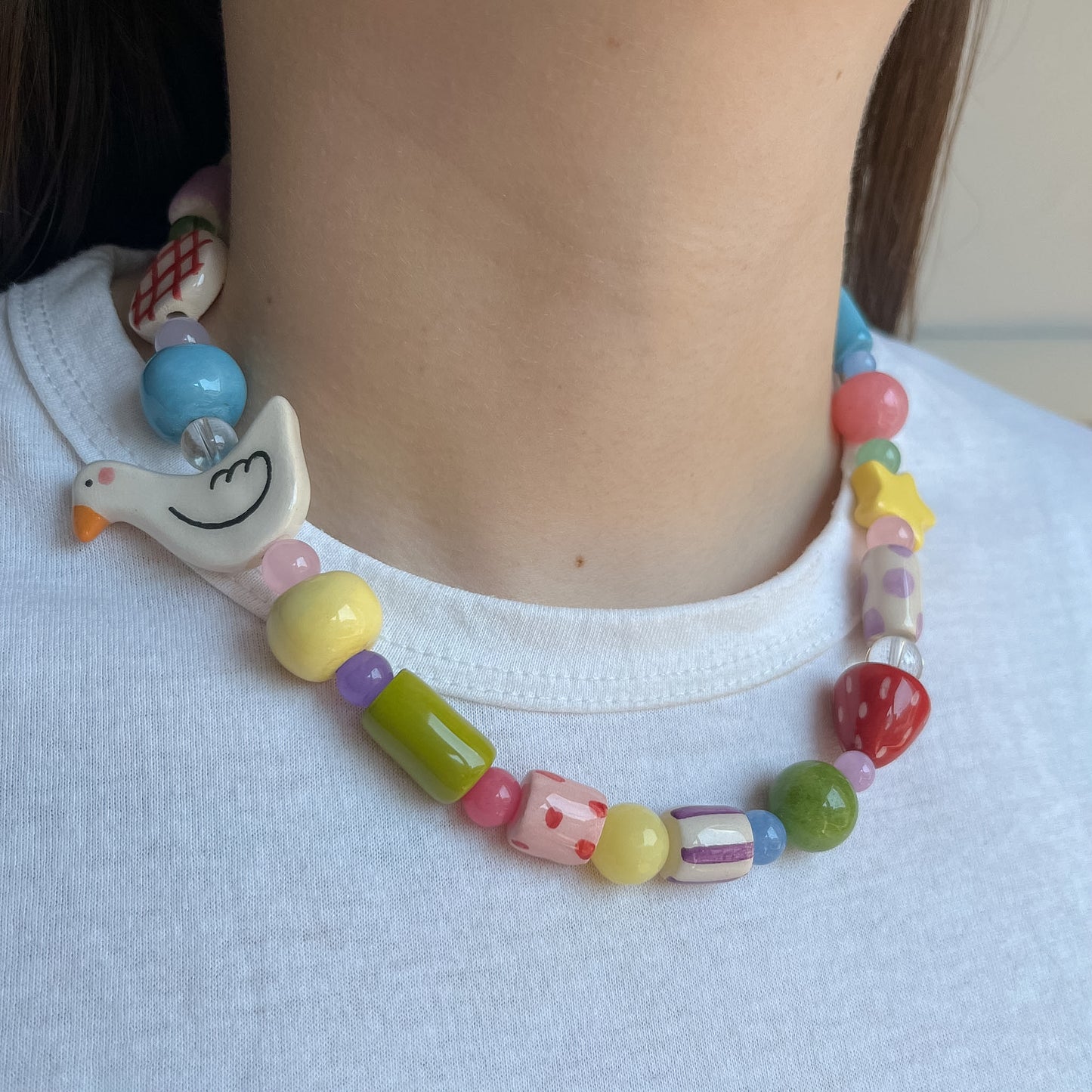 Collana con paperella e stellina