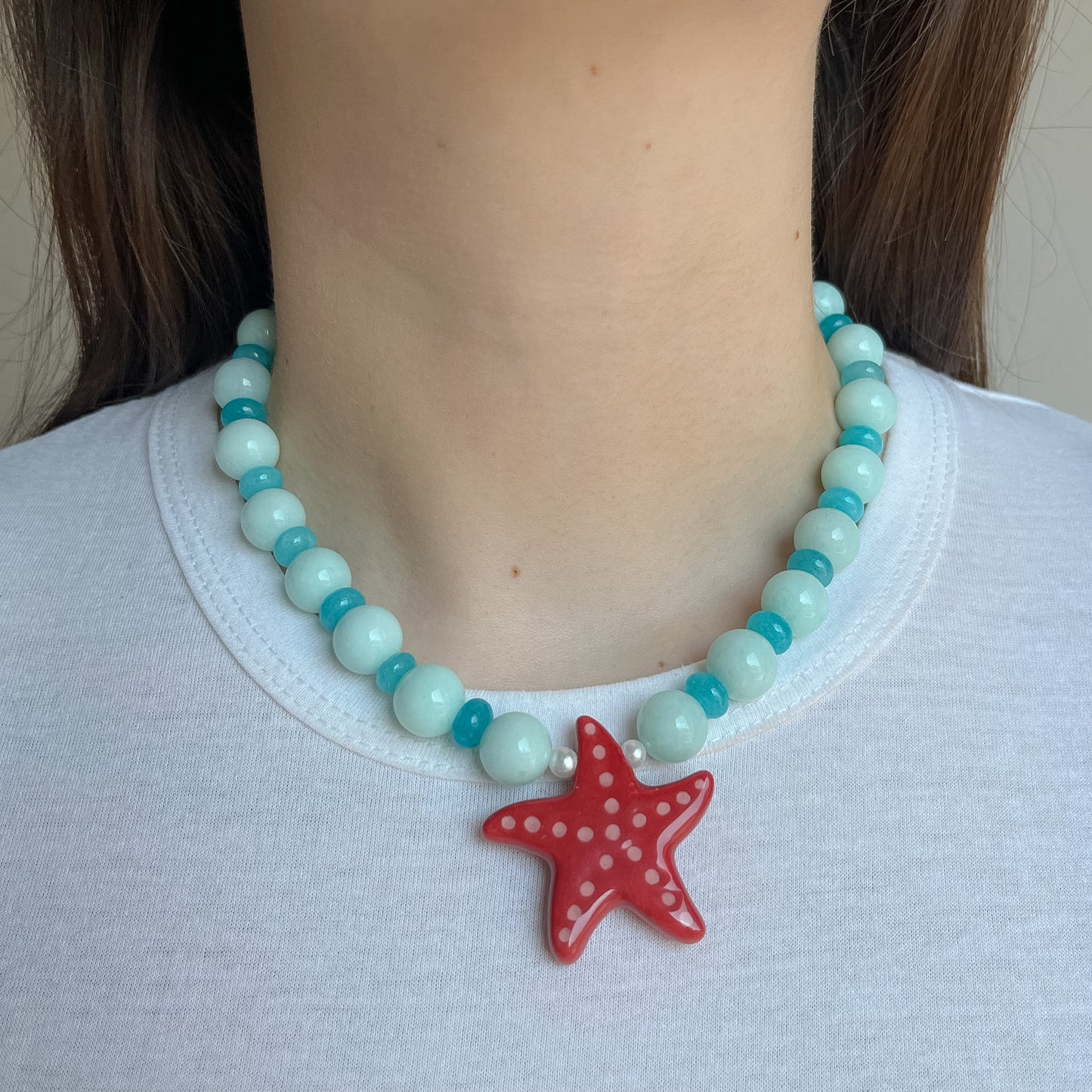 Collana con stella marina rossa
