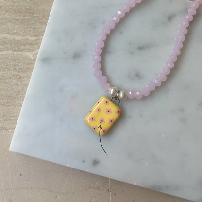 Collana rosa con ciondolo fiorellini