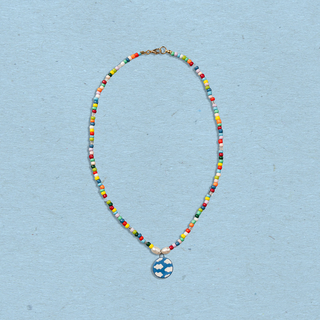 Collana di perline con ciondolo cielo