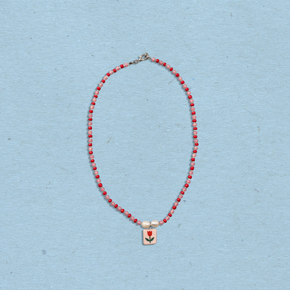Collana di perline con ciondolo tulipano
