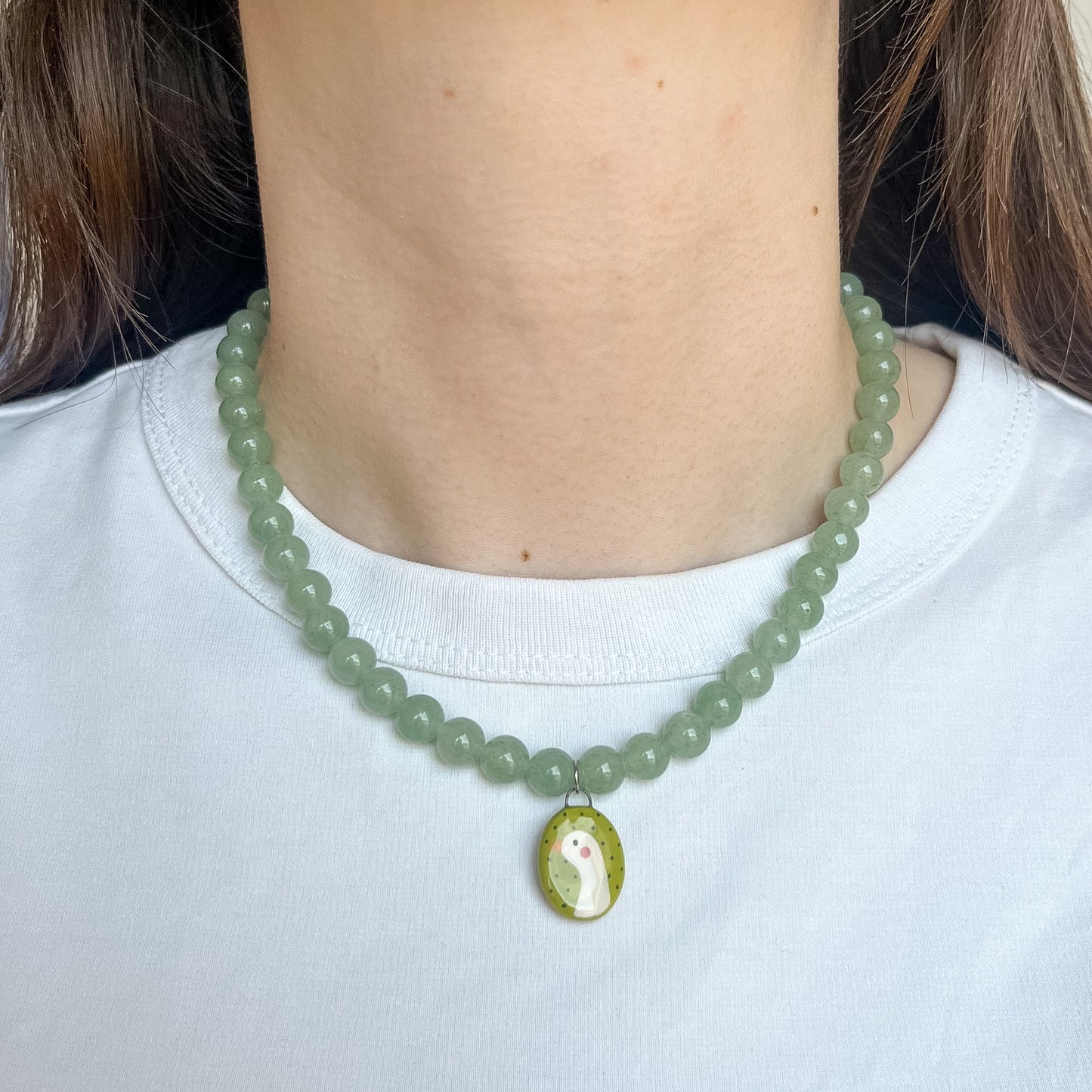 Collana verde con paperella