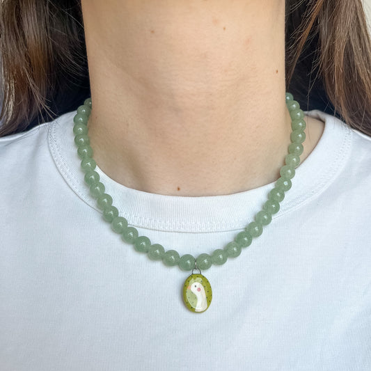 Collana verde con paperella