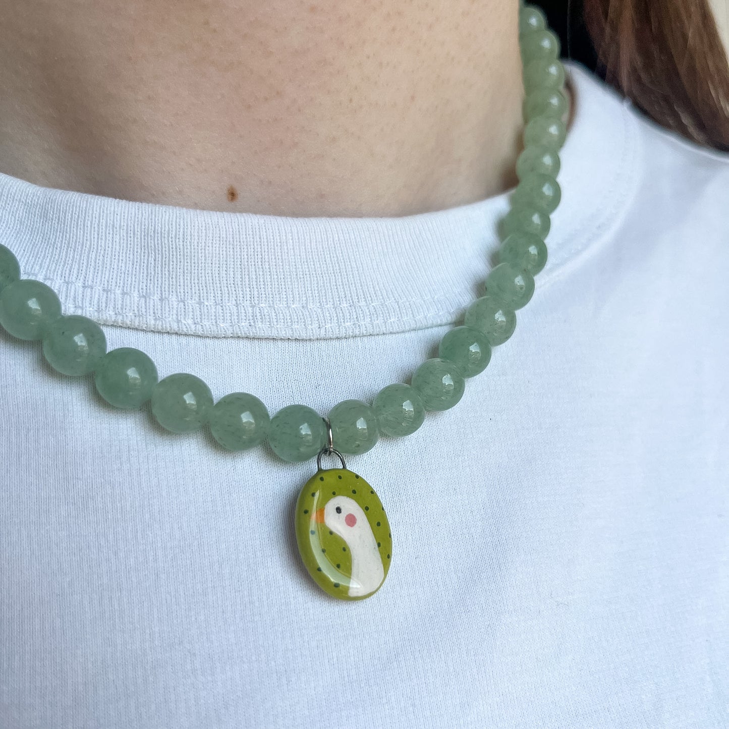 Collana verde con paperella