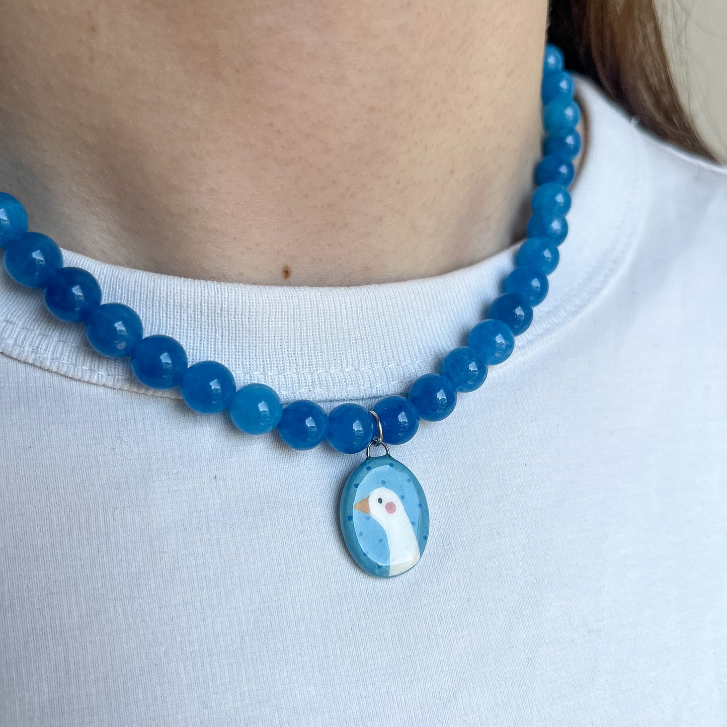 Collana blu con paperella