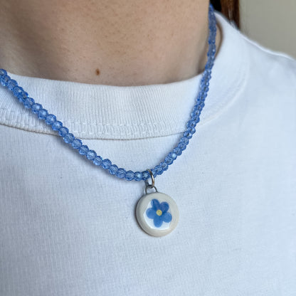 Collanina con fiorellino blu