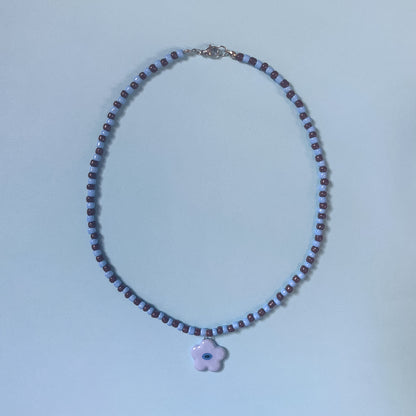 Collana con fiorellino azzurro