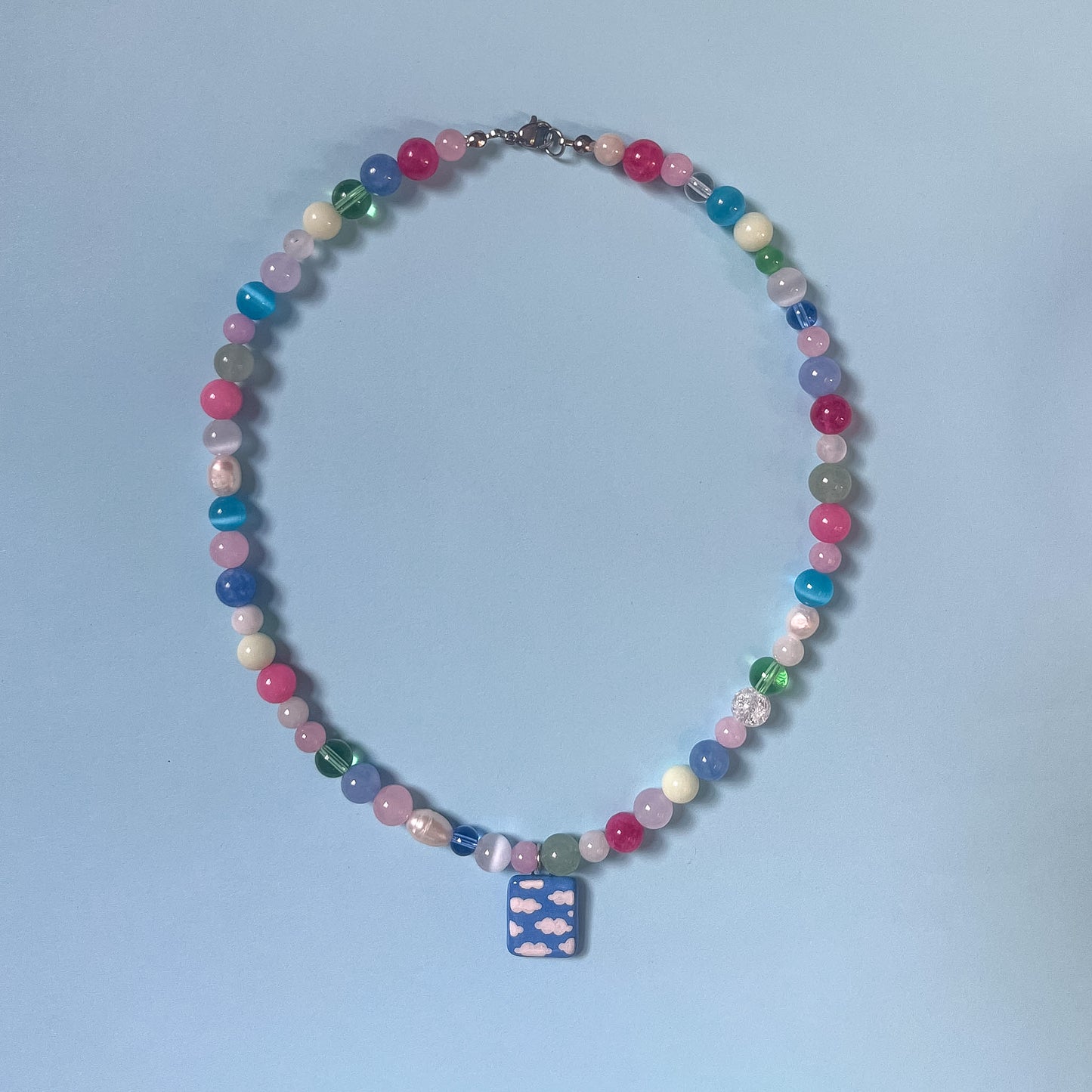 Collana colori pastello con ciondolo cielo