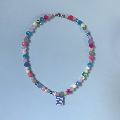 Collana colori pastello con ciondolo cielo