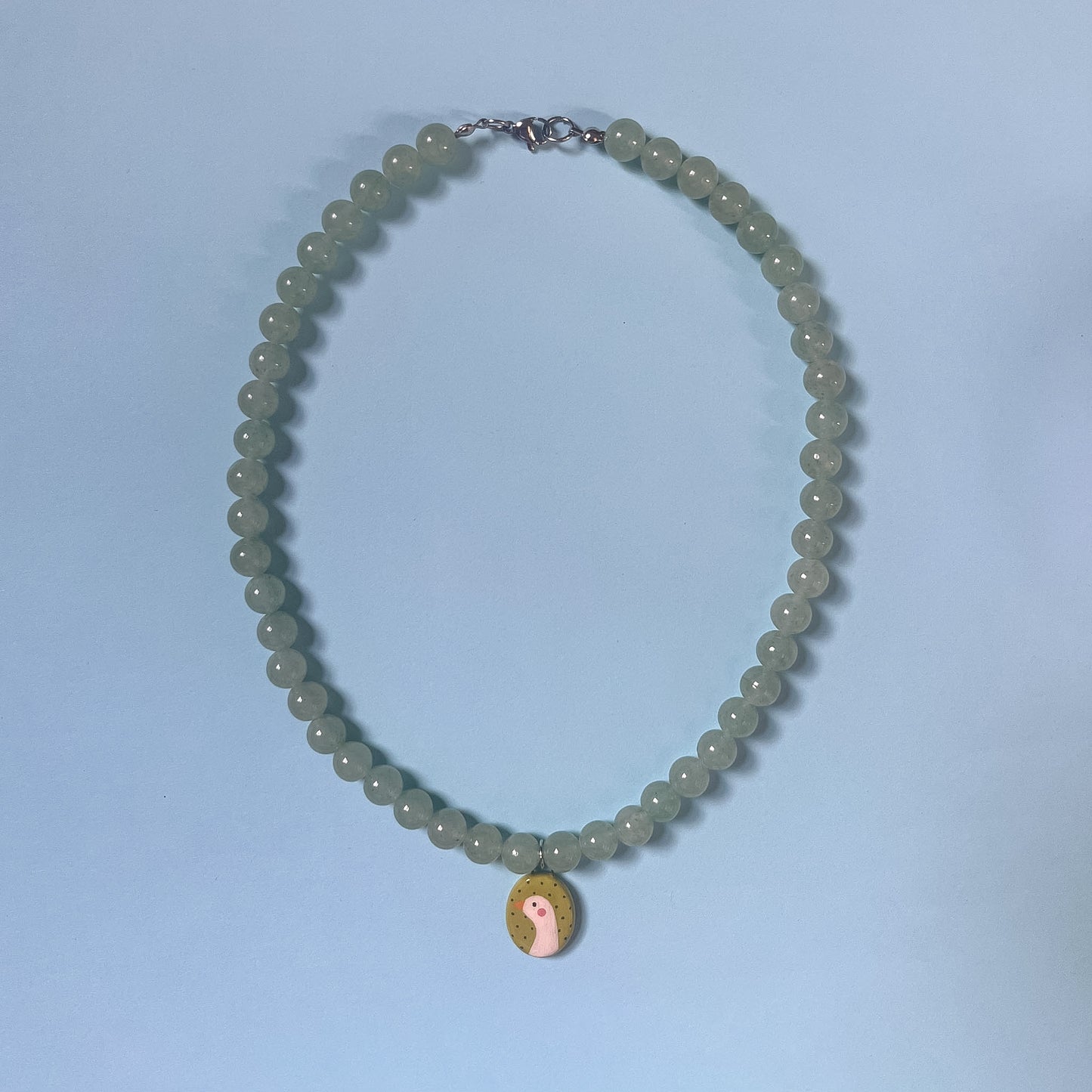 Collana verde con paperella