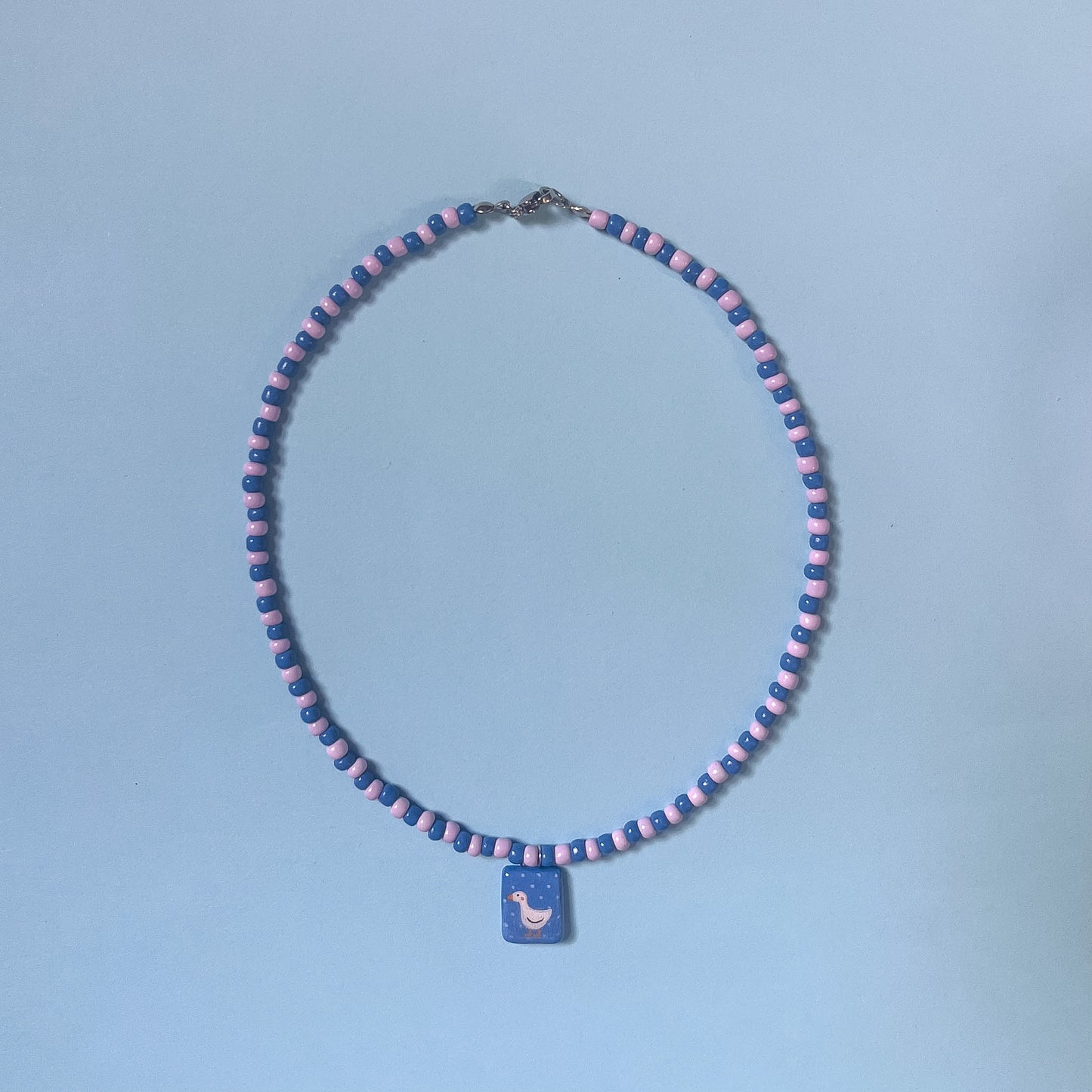 Collanina con paperella blu