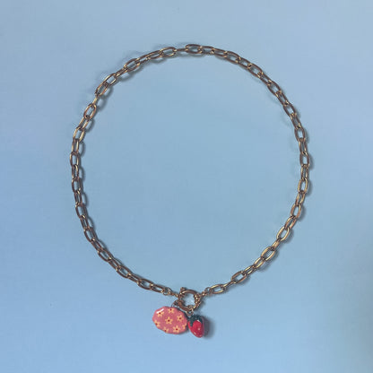 Catenella oro con fiorellini e fragola