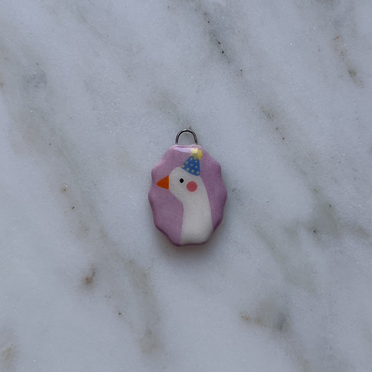 Medagliette ovali con bordo ondulato