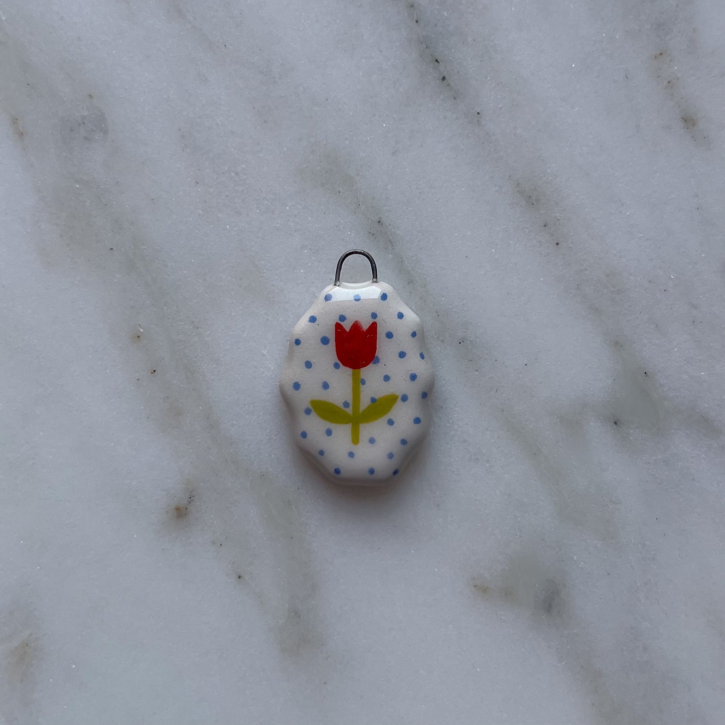 Medagliette ovali con bordo ondulato
