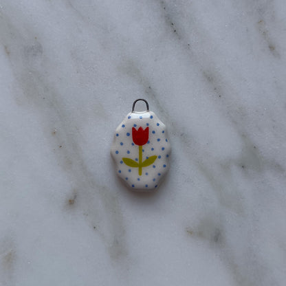 Medagliette ovali con bordo ondulato