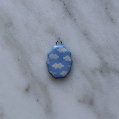 Medagliette ovali con bordo ondulato
