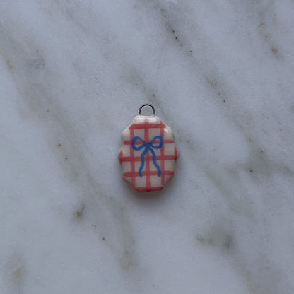 Medagliette ovali con bordo ondulato