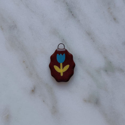 Medagliette ovali con bordo ondulato
