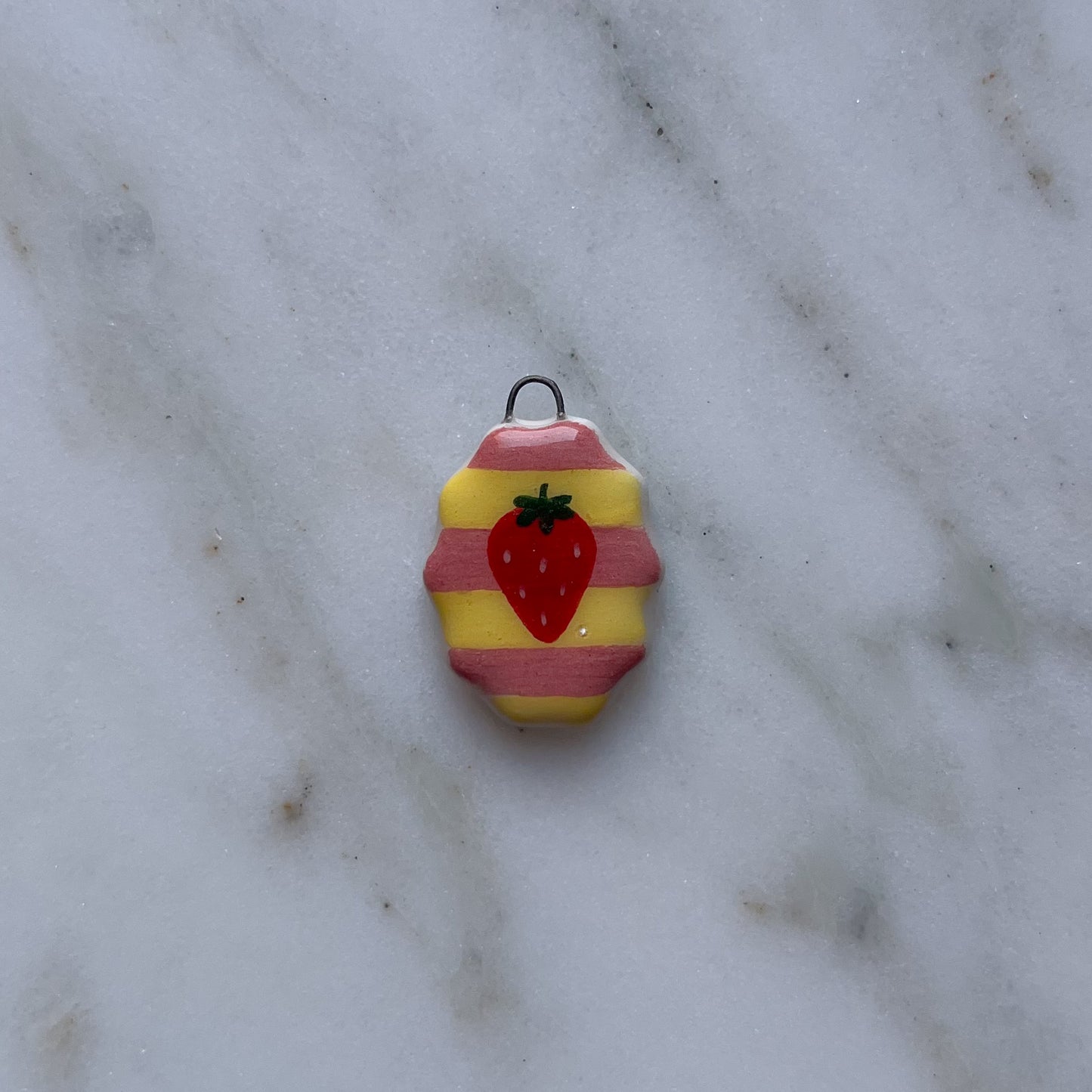 Medagliette ovali con bordo ondulato
