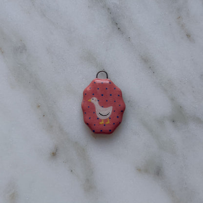 Medagliette ovali con bordo ondulato