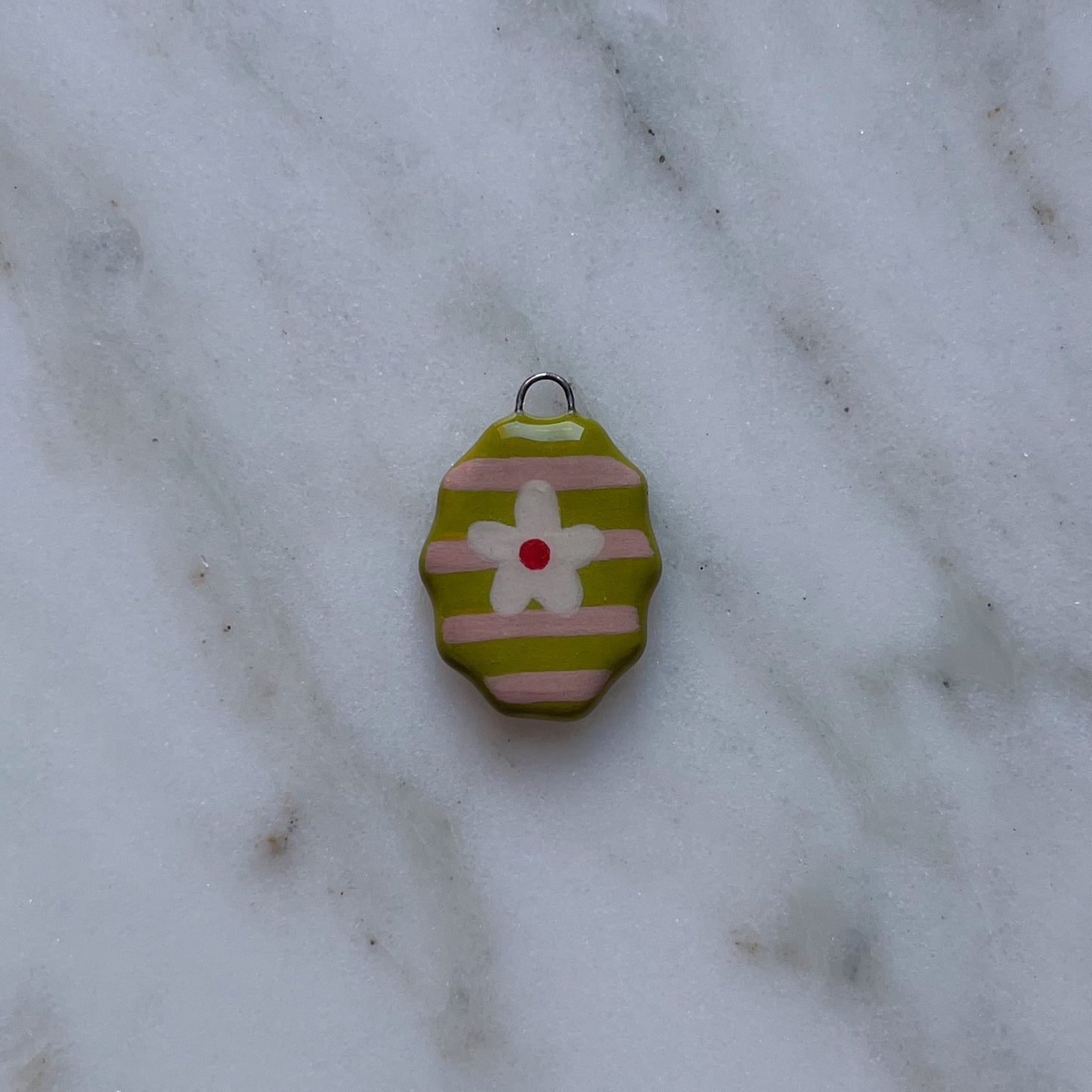 Medagliette ovali con bordo ondulato